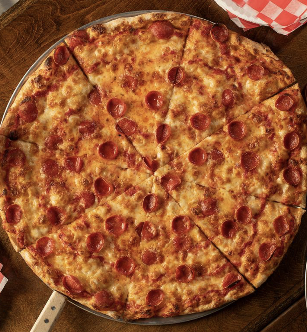 A photo of a large pizza A photo of a large pizza